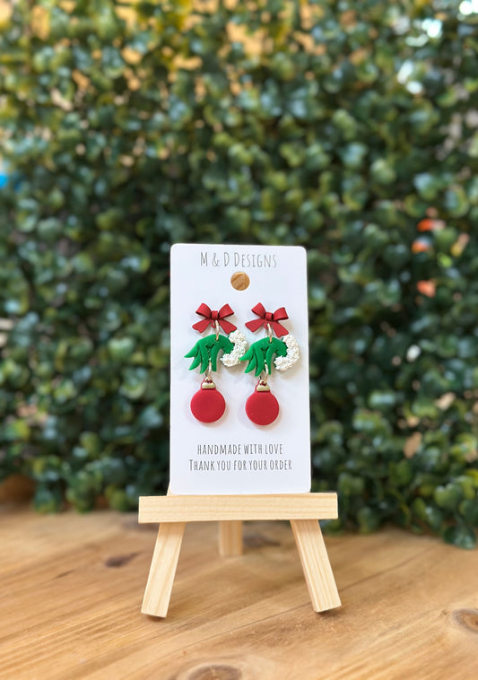 Green Christmas Monster Hand Holding Ornament